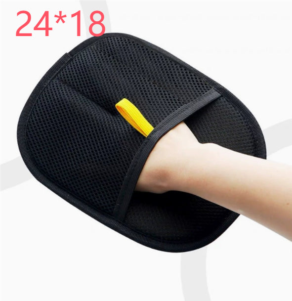 Black mesh pet hair removal mitt with a hand pocket and yellow tab